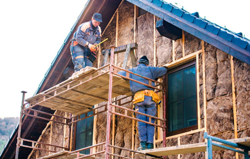 Traditional two-person window installation